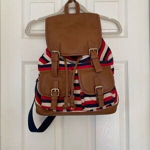 Charming Charlie Red and Blue Striped Backpack with Brown Accents